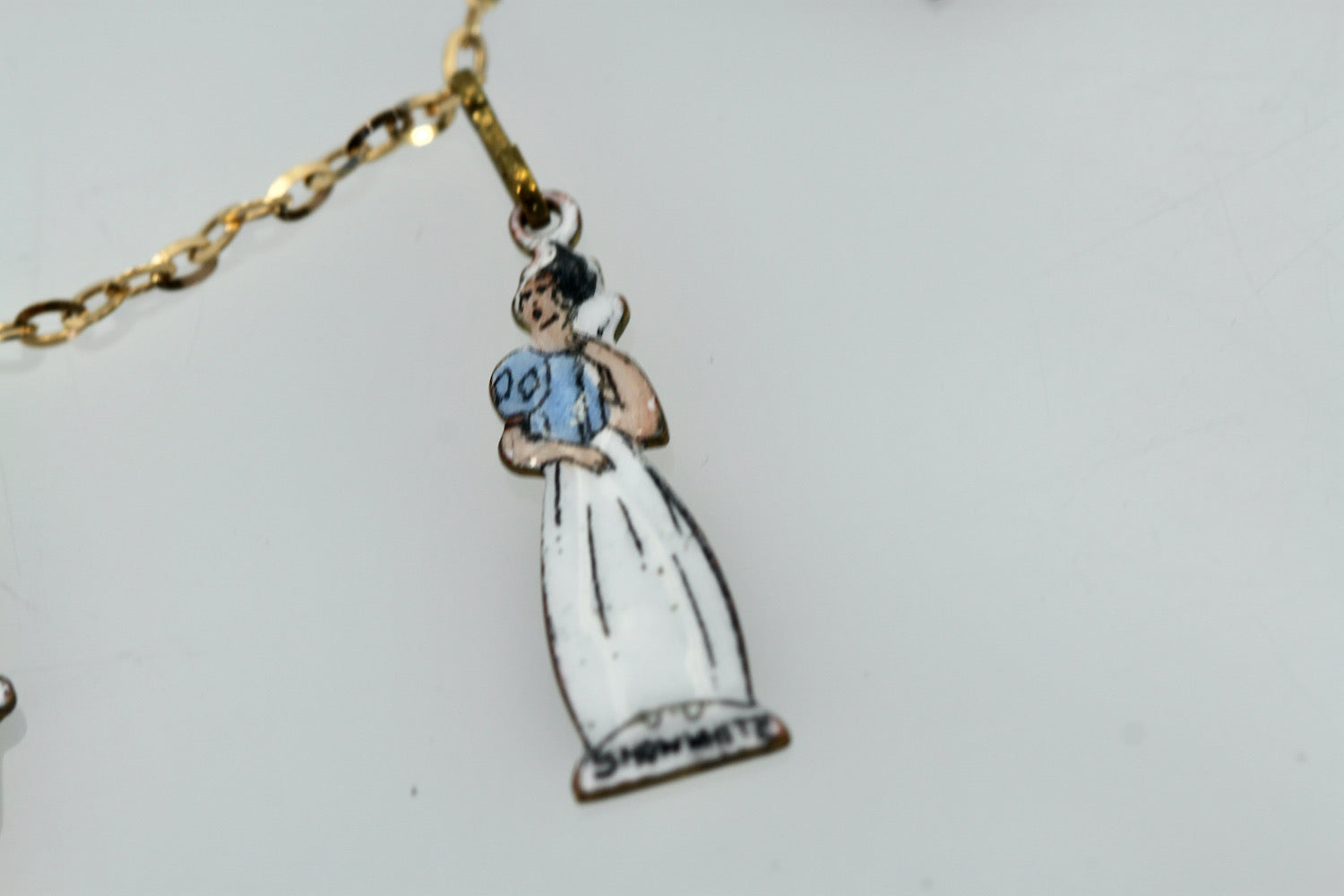 Gold necklace with Disney figures