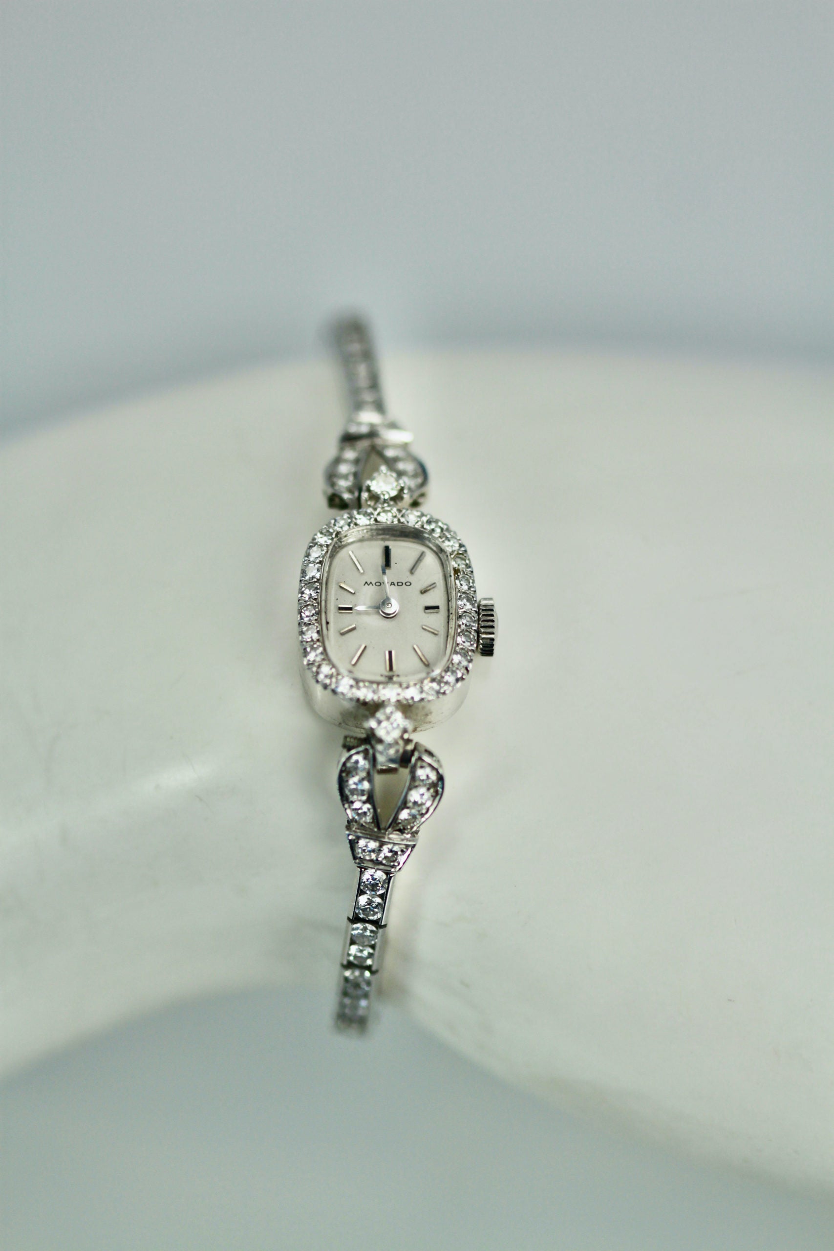 Diamond-studded Movado watch, 14K