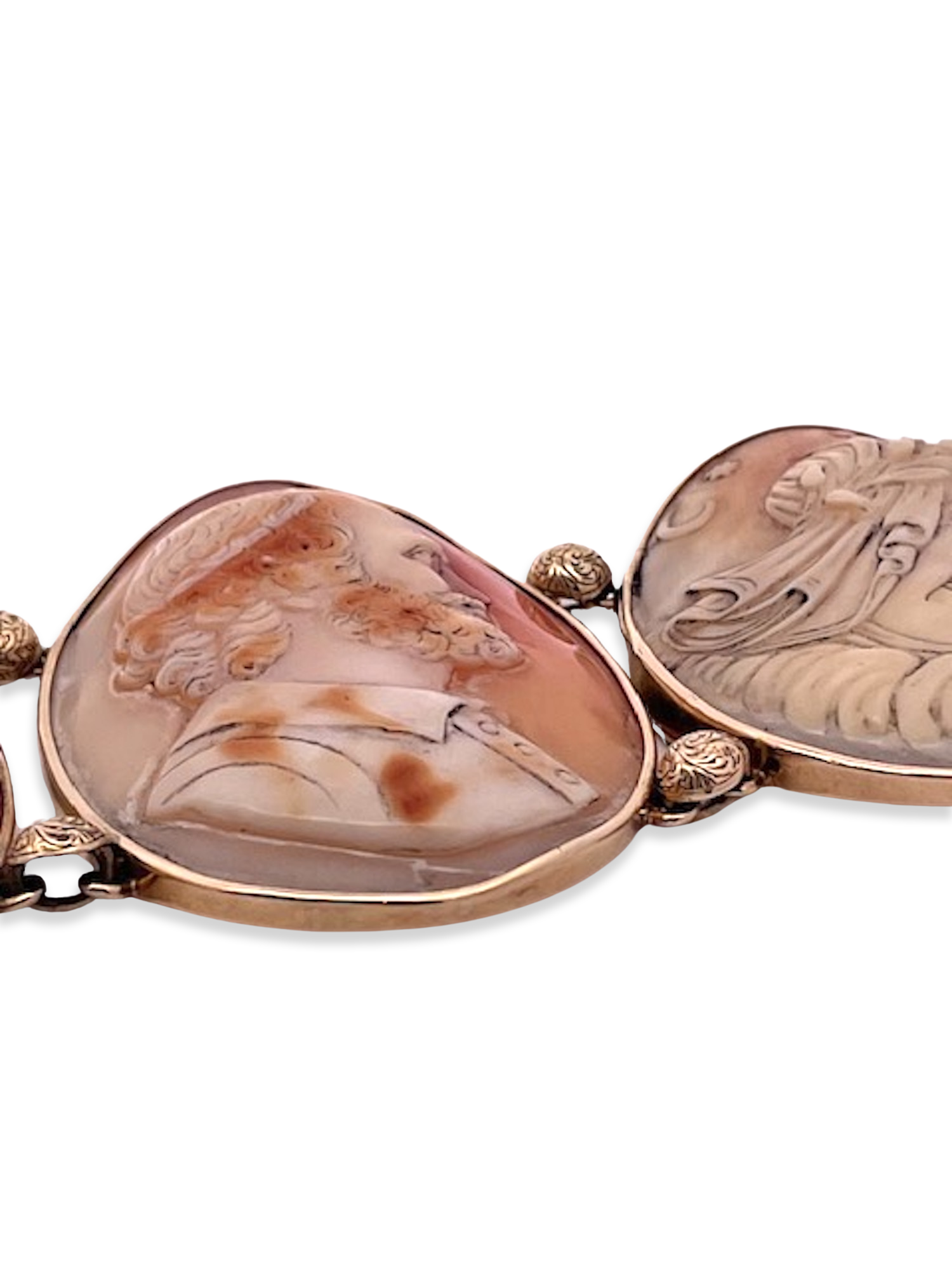Two stone pendants with engraved faces
