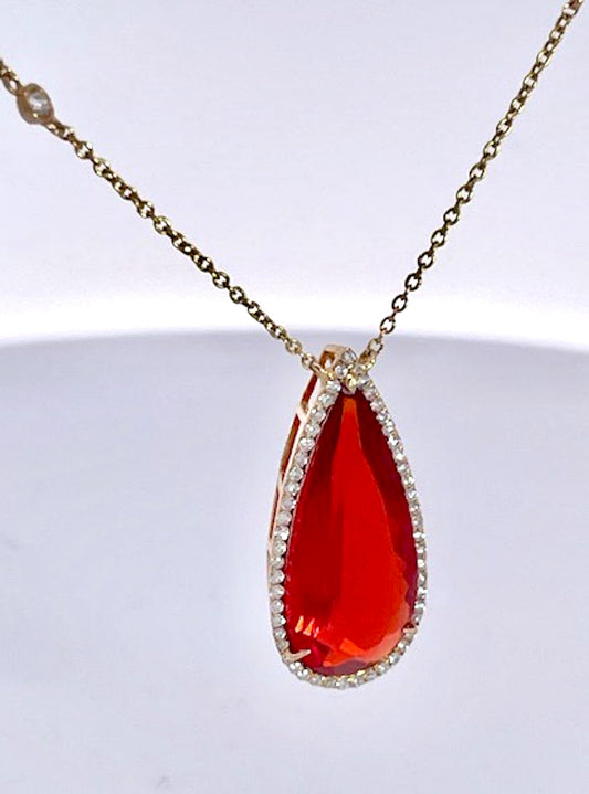 Fire Opal with Diamond surround 18K