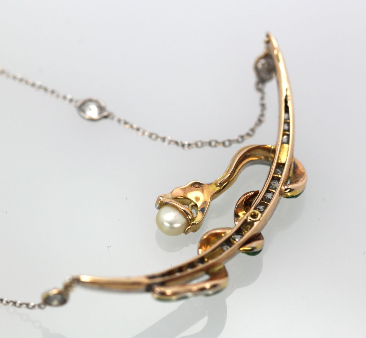 Snake Holding Pearl Necklace