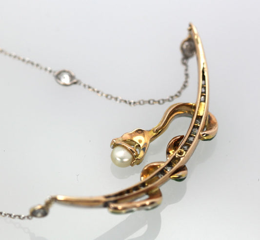 Snake Holding Pearl Necklace