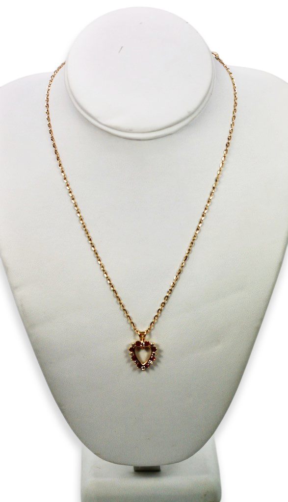 Yellow gold heart pendant with gems