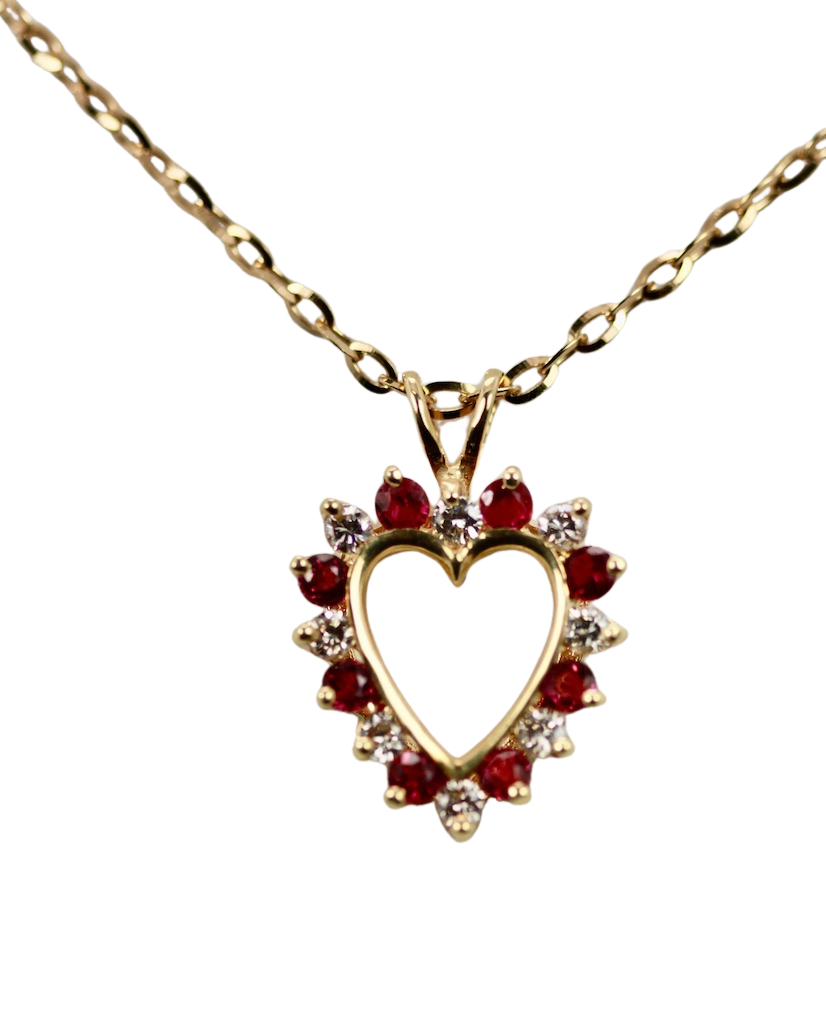 Diamond ruby heart on gold