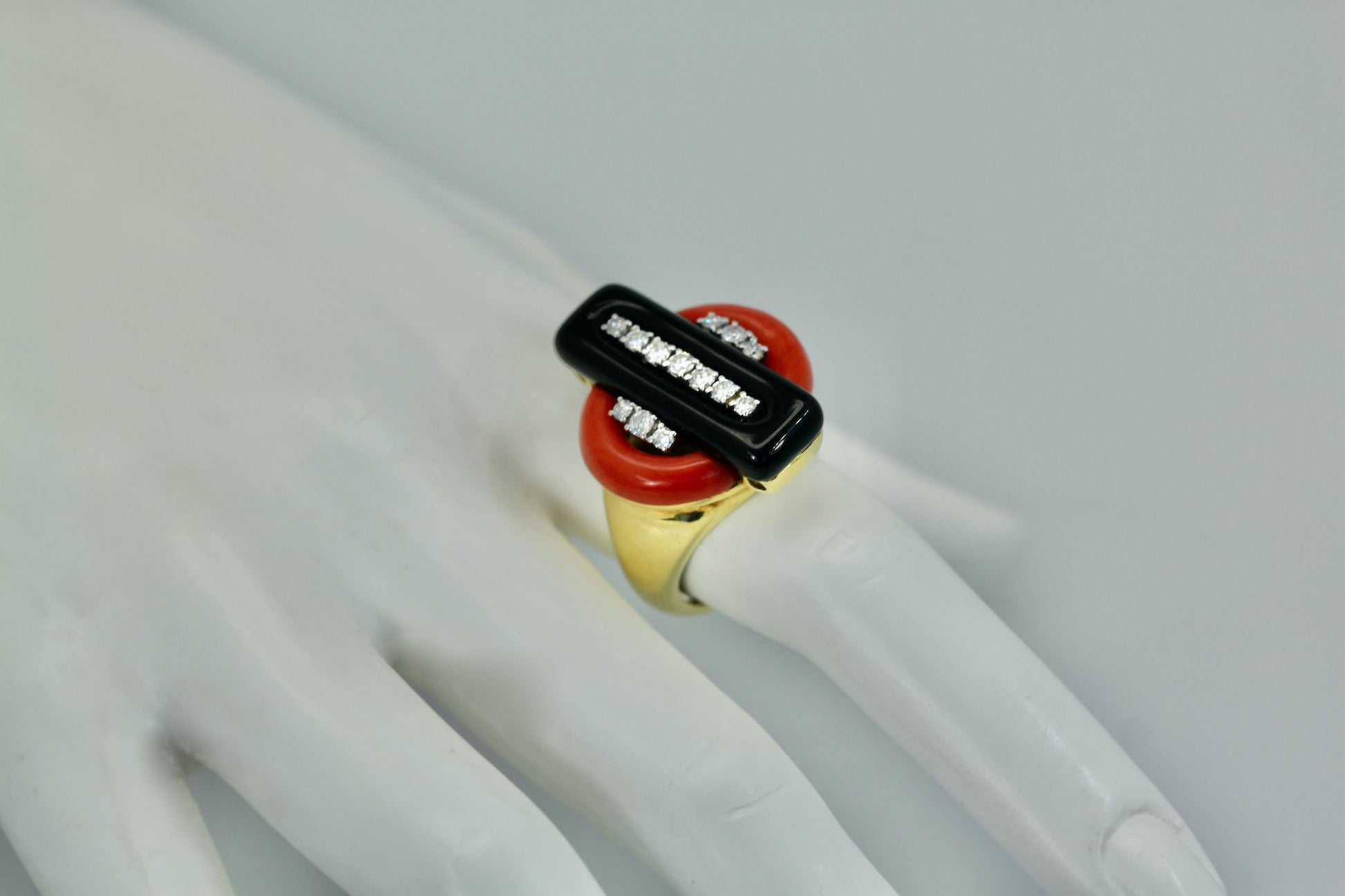 Coral and onyx diamond ring