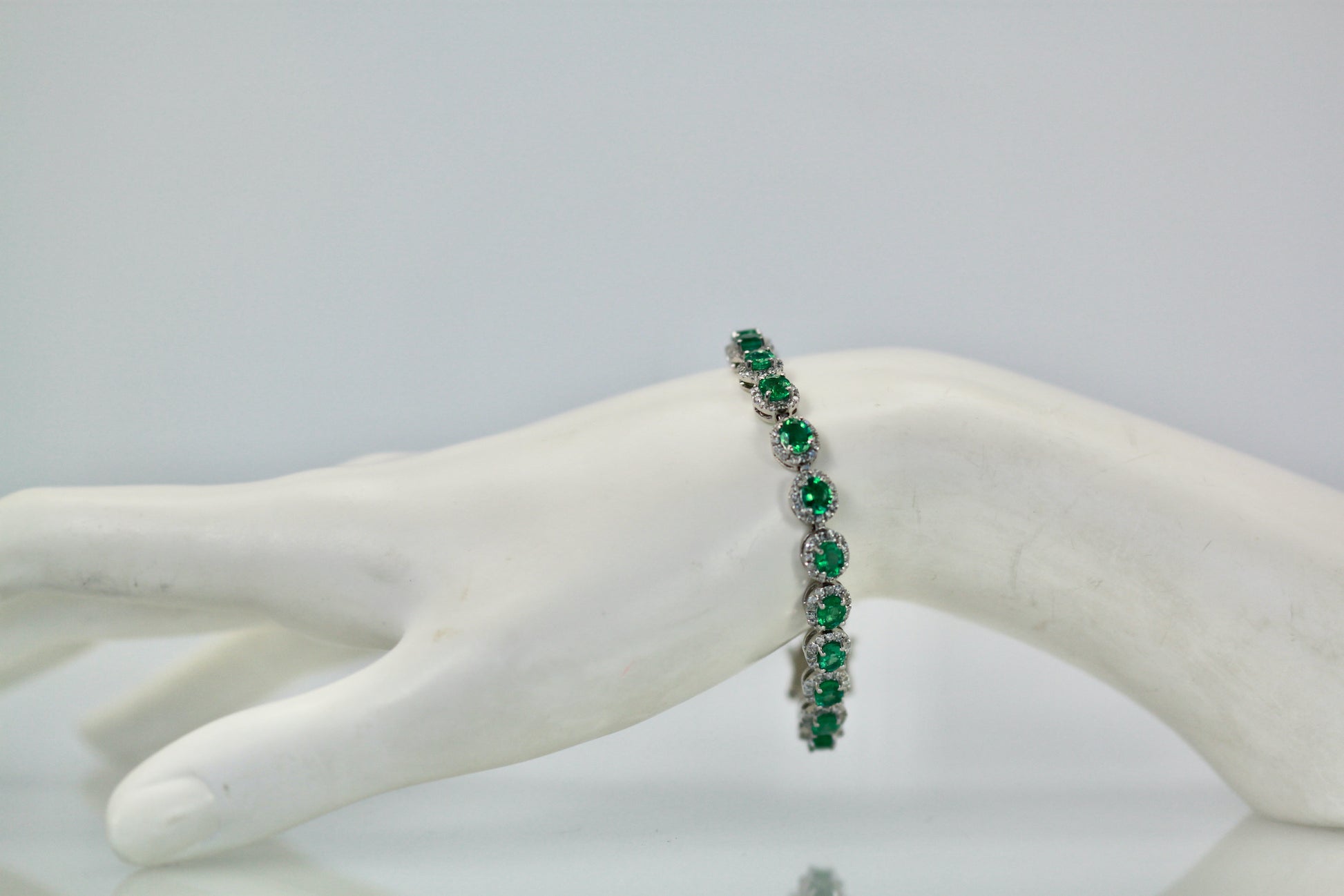 Emerald and diamond link bracelet