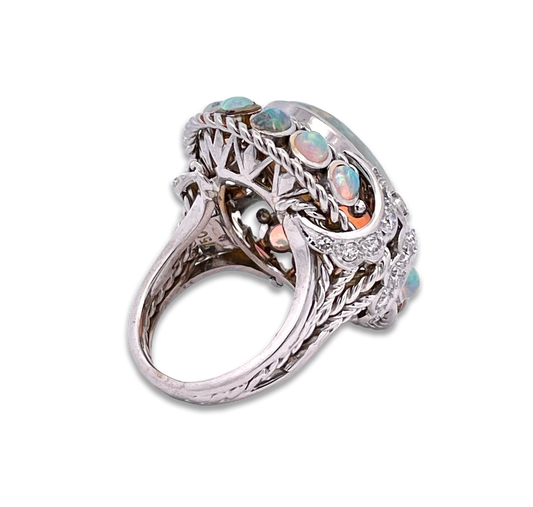 Diamond halo opal ring

