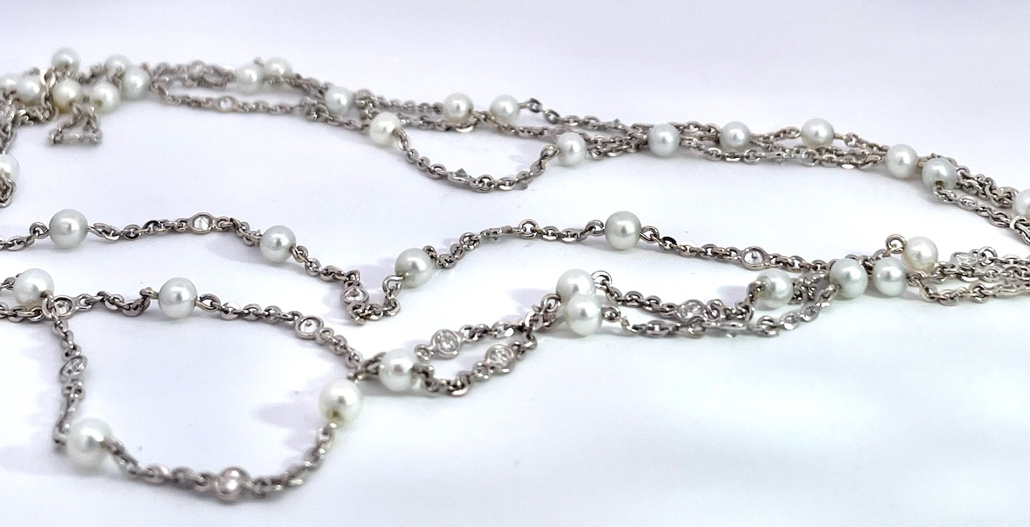 Pearl and diamond necklace, 52"