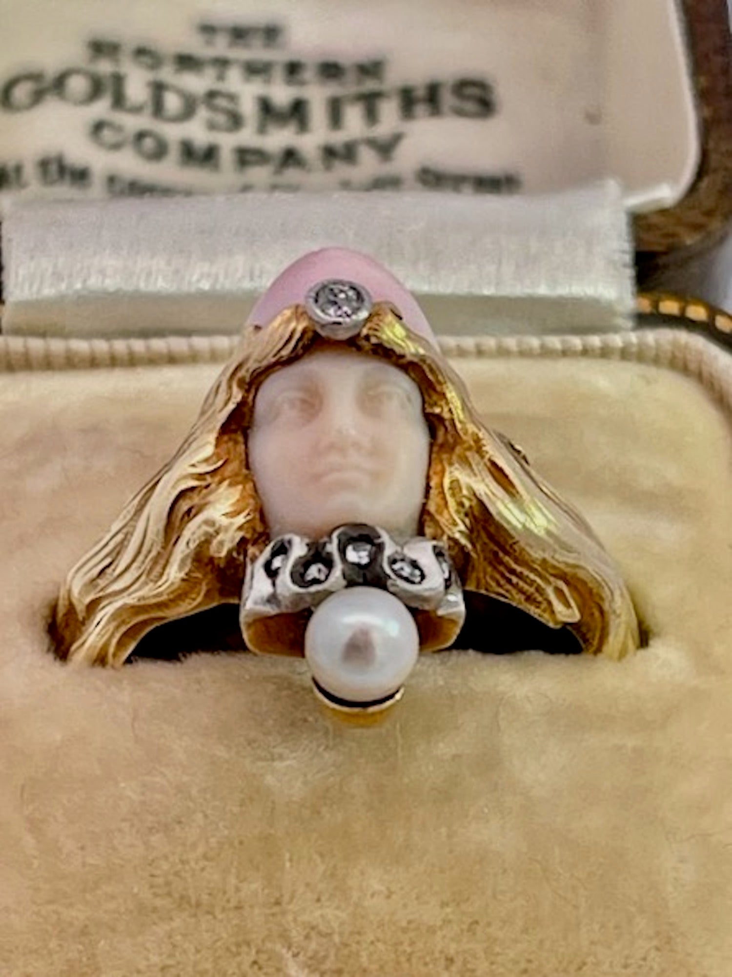 Gold Flowing Hair Ring with Coral Carving