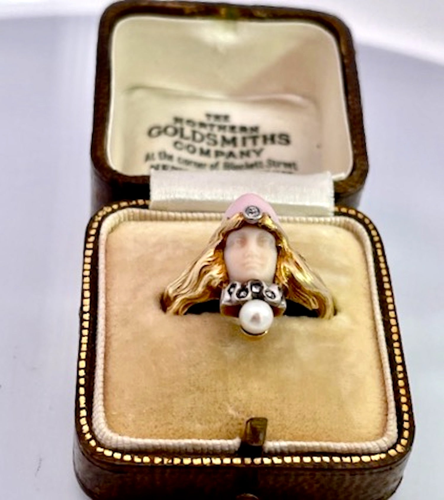 Carved Coral Lady Ring with Diamond Accents