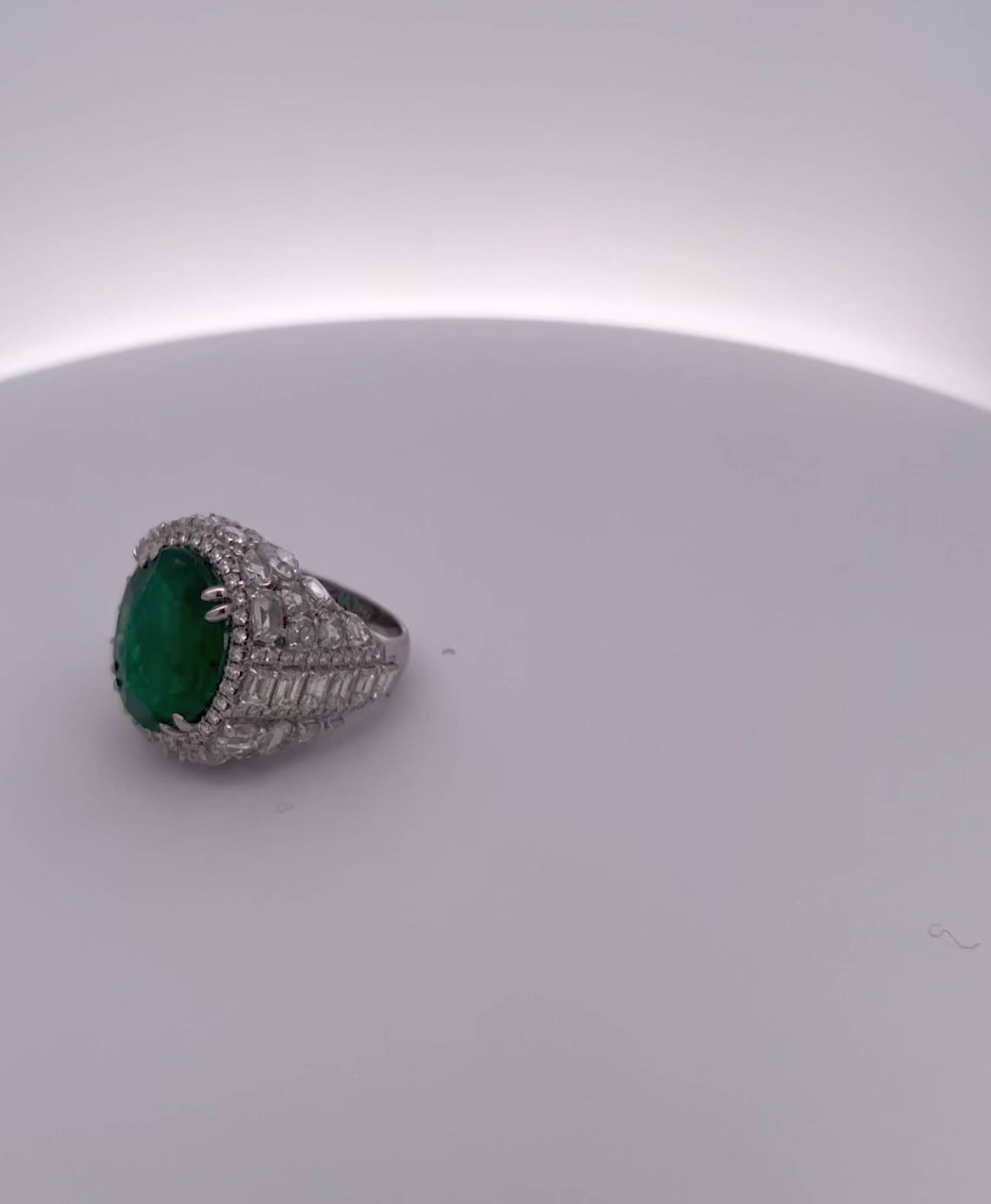 Oval Emerald 12.25 Carat Ring Diamond Surround