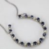 Pearl & Sapphire Good Luck Horseshoe Necklace - close up