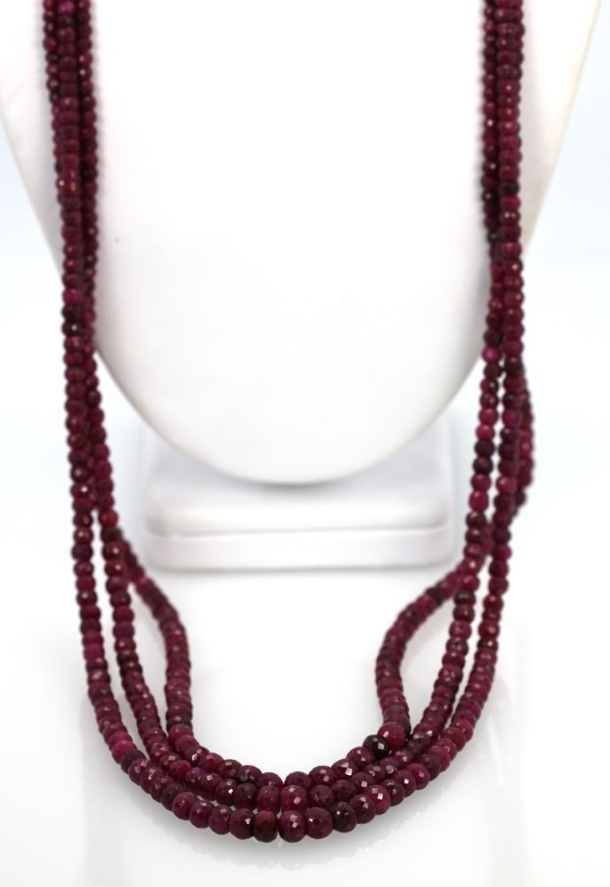 Triple Strand Ruby Bead Necklace with Diamonds – hanging and draped