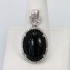 Art Deco Onyx Pendant Diamond Surround - against stand