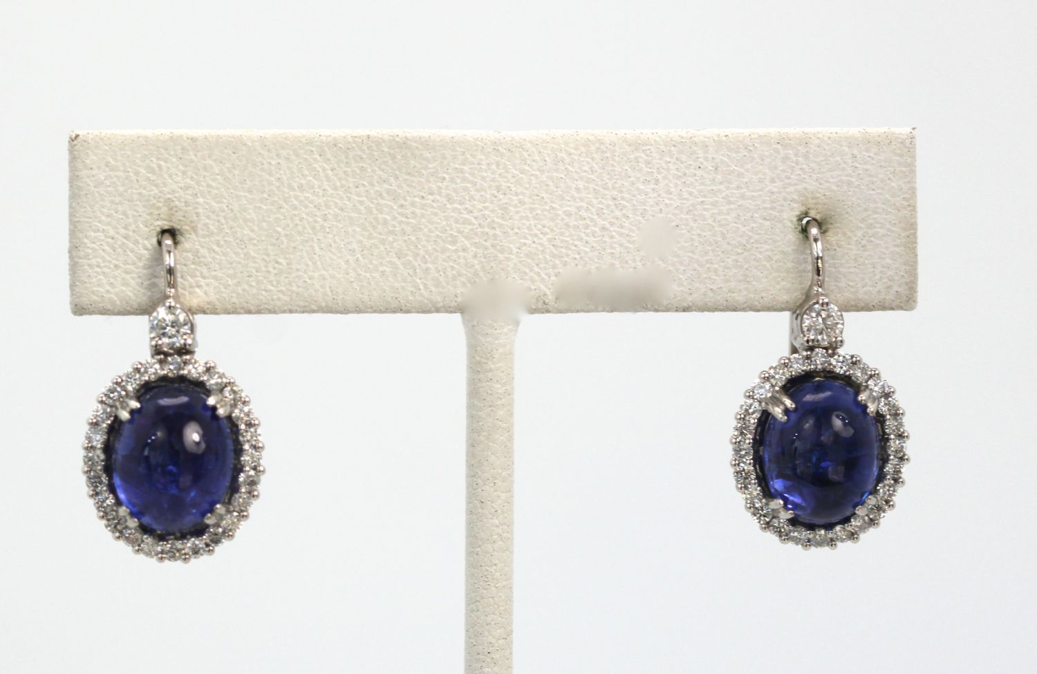 Tanzanite Cabochon Diamond Earrings – on stand