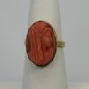 Antique Deco High Relief Carved Italian Coral Maiden Ring on stand