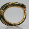 Enamel Snake Bangle Bracelet With Yellow Gold & Diamonds on stand