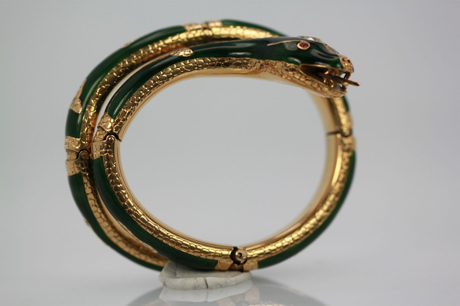 Enamel Snake Bangle Bracelet With Yellow Gold & Diamonds on stand