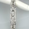 Deco 18K Round & Baguette Diamond 6.97 Carats Bracelet draped