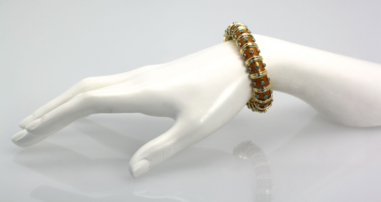 tTiffany & Co. Schlumberger Copper Enamel and Turquoise Narrow Bracelet Iconic on wrist