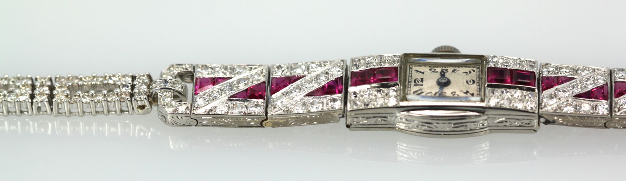 Diamond Ruby Platinum Bracelet Watch – band left side