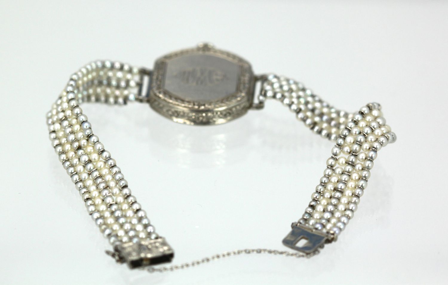 Platinum Diamond Pearl Watch – back