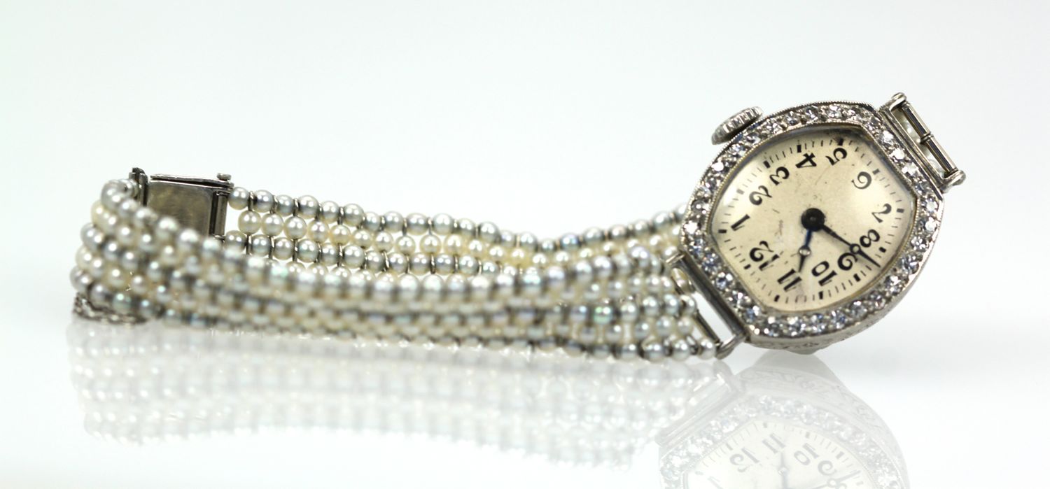 Platinum Diamond Pearl Watch – laying flat
