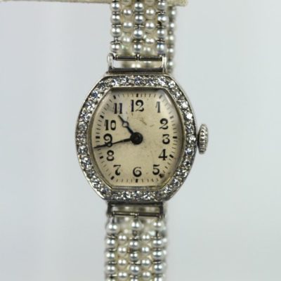 Platinum Diamond Pearl Watch - hanging