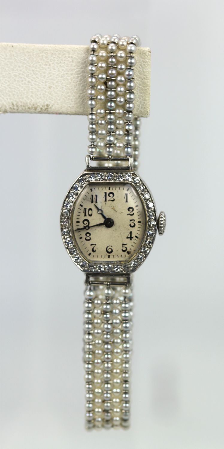 Platinum Diamond Pearl Watch – hanging