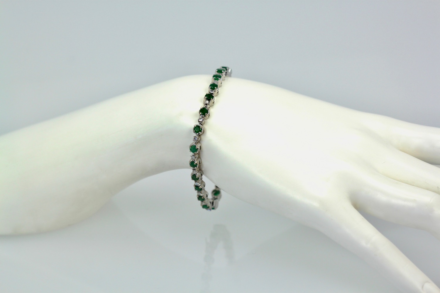 Emerald Diamond 18 Karat White Gold Bracelet 4.20 Carat Diamonds and Emeralds on wrist
