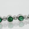 Emerald Diamond 18 Karat White Gold Bracelet 4.20 Carat Diamonds and Emeralds close up angle