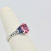 Three-Stone Ring in Pink and Blue Sapphires - left side