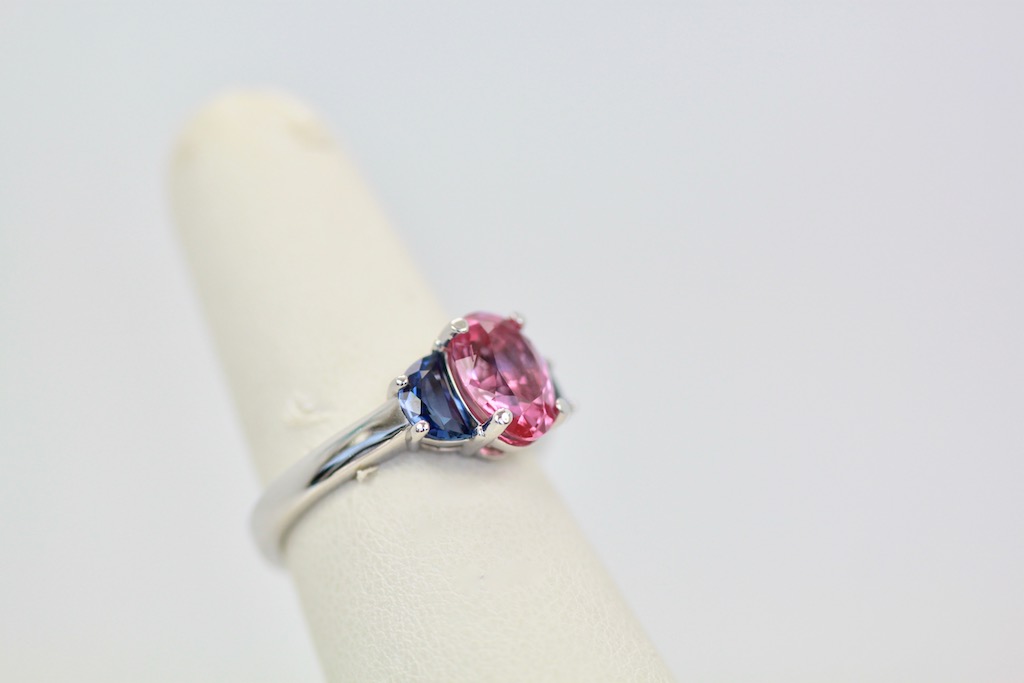 Three-Stone Ring in Pink and Blue Sapphires – left side