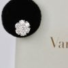 Van Cleef & Arpels Fleurette Large Diamond Stud Earrings - close on stand