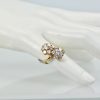 Van Cleef & Arpels Fleurette Ring Double Flower Motif - on model