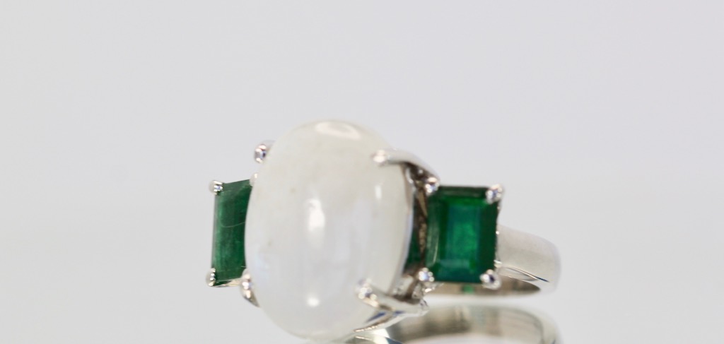 Moonstone 3 stone Ring with Emeralds – left angle