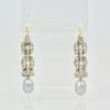 Deco Diamond Pearl Drop Earrings Platinum - set on stand