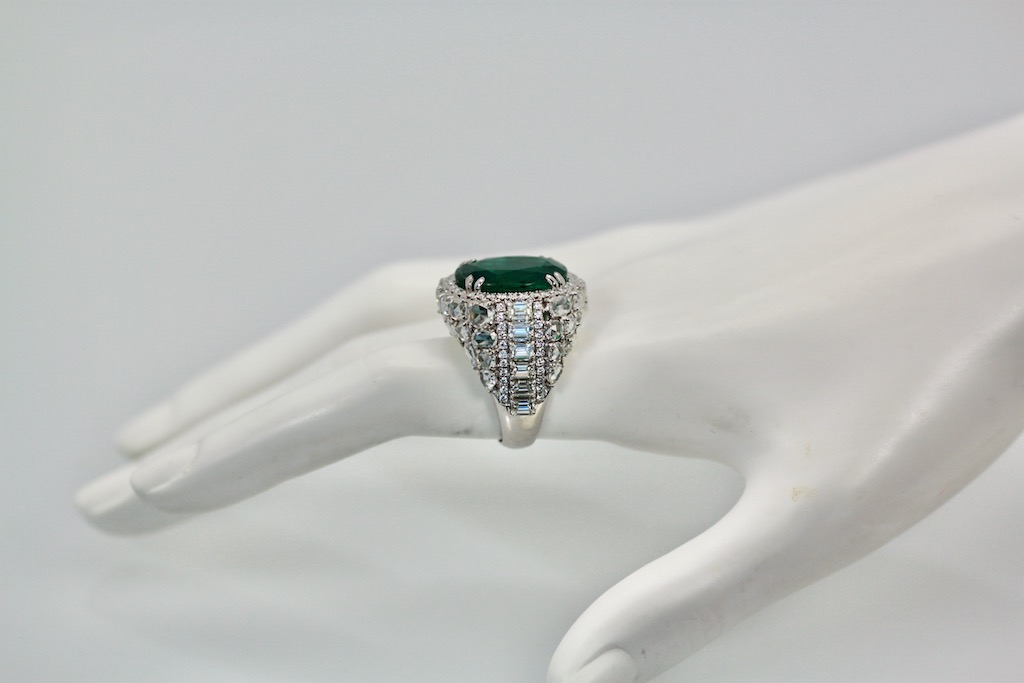 Oval Emerald 12.25 Carat Diamond Ring – side angle on model