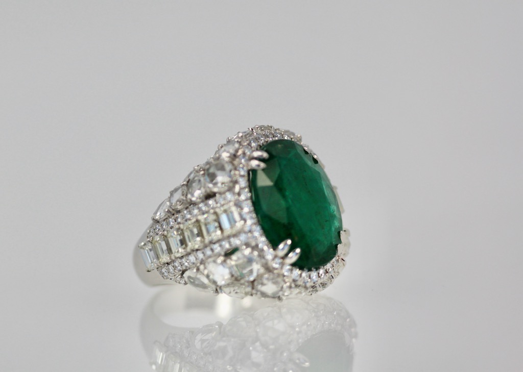 Oval Emerald 12.25 Carat Diamond Ring – right angle