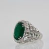 Oval Emerald 12.25 Carat Diamond Ring - left angle