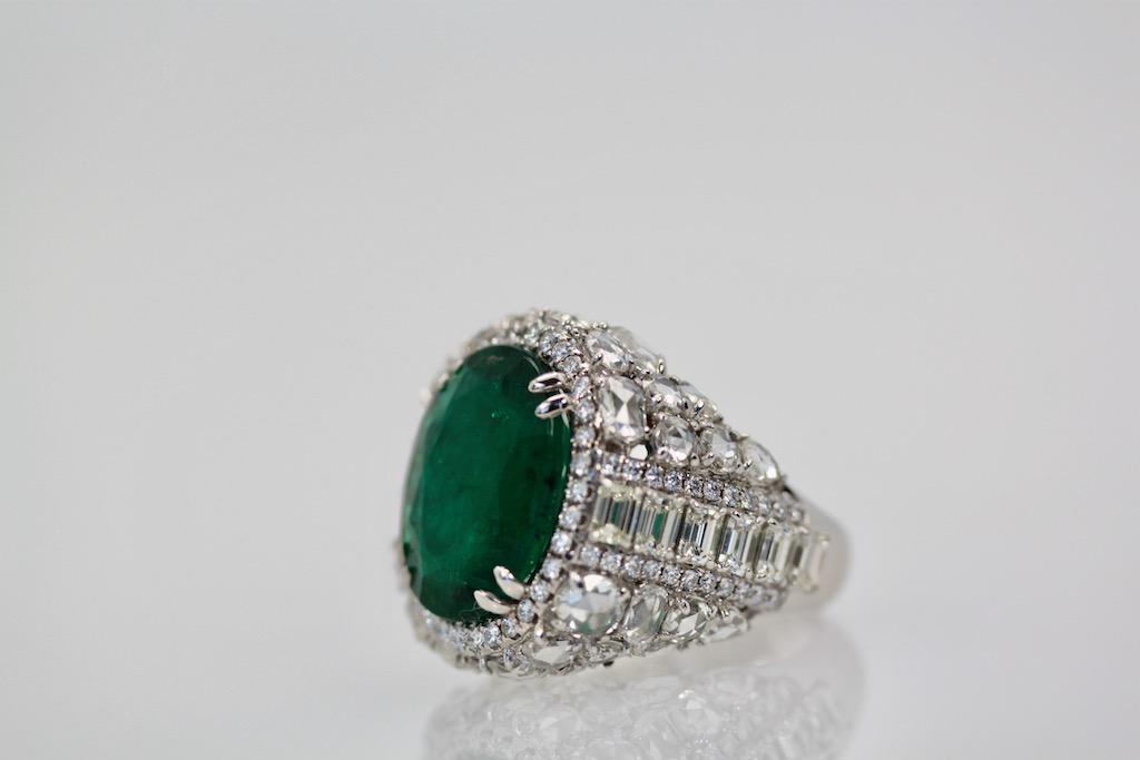 Oval Emerald 12.25 Carat Diamond Ring – left angle
