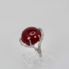 Huge Ruby Cabochon Diamond Surround Ring - on stand