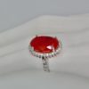 Large Fire Opal ring with Diamond surround - model close