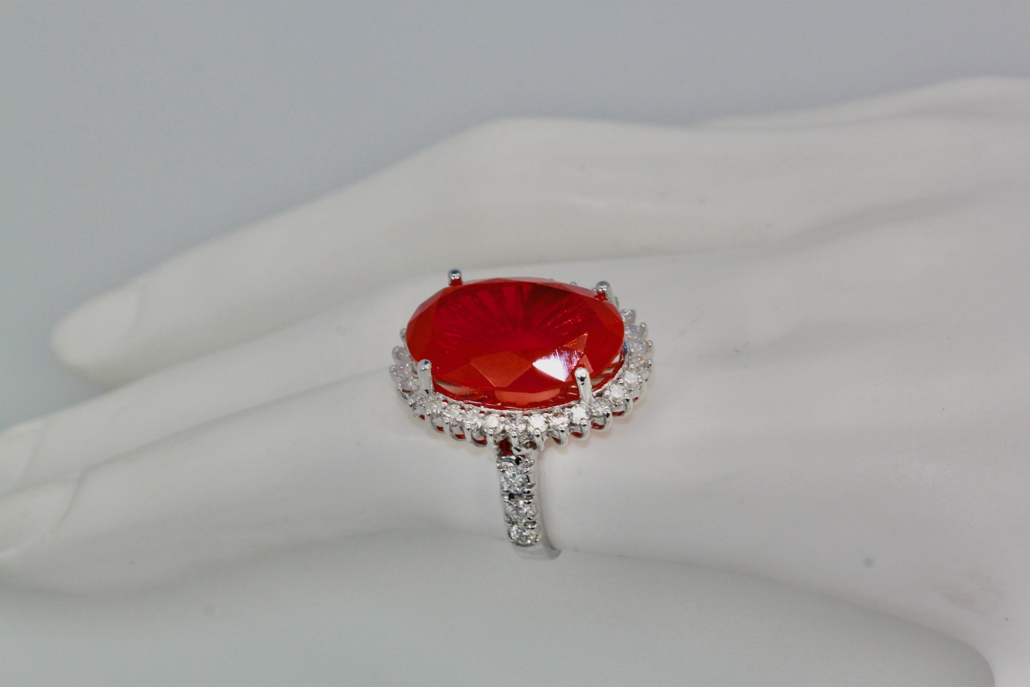 Large Fire Opal ring with Diamond surround – model close