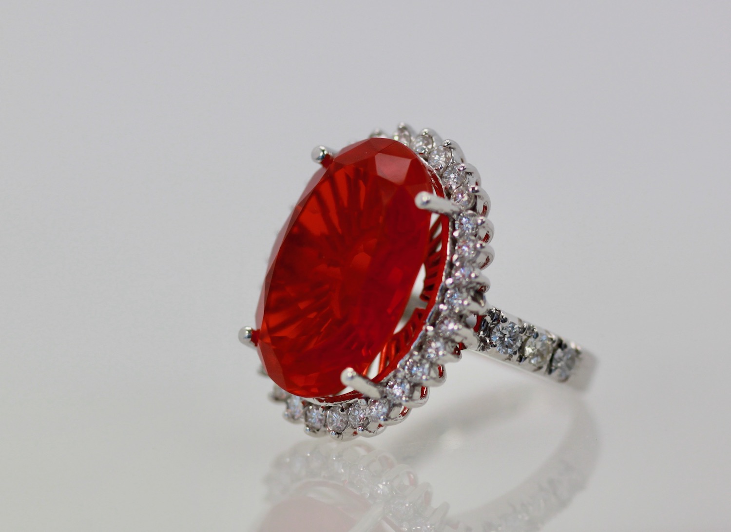 Large Fire Opal ring with Diamond surround – angle