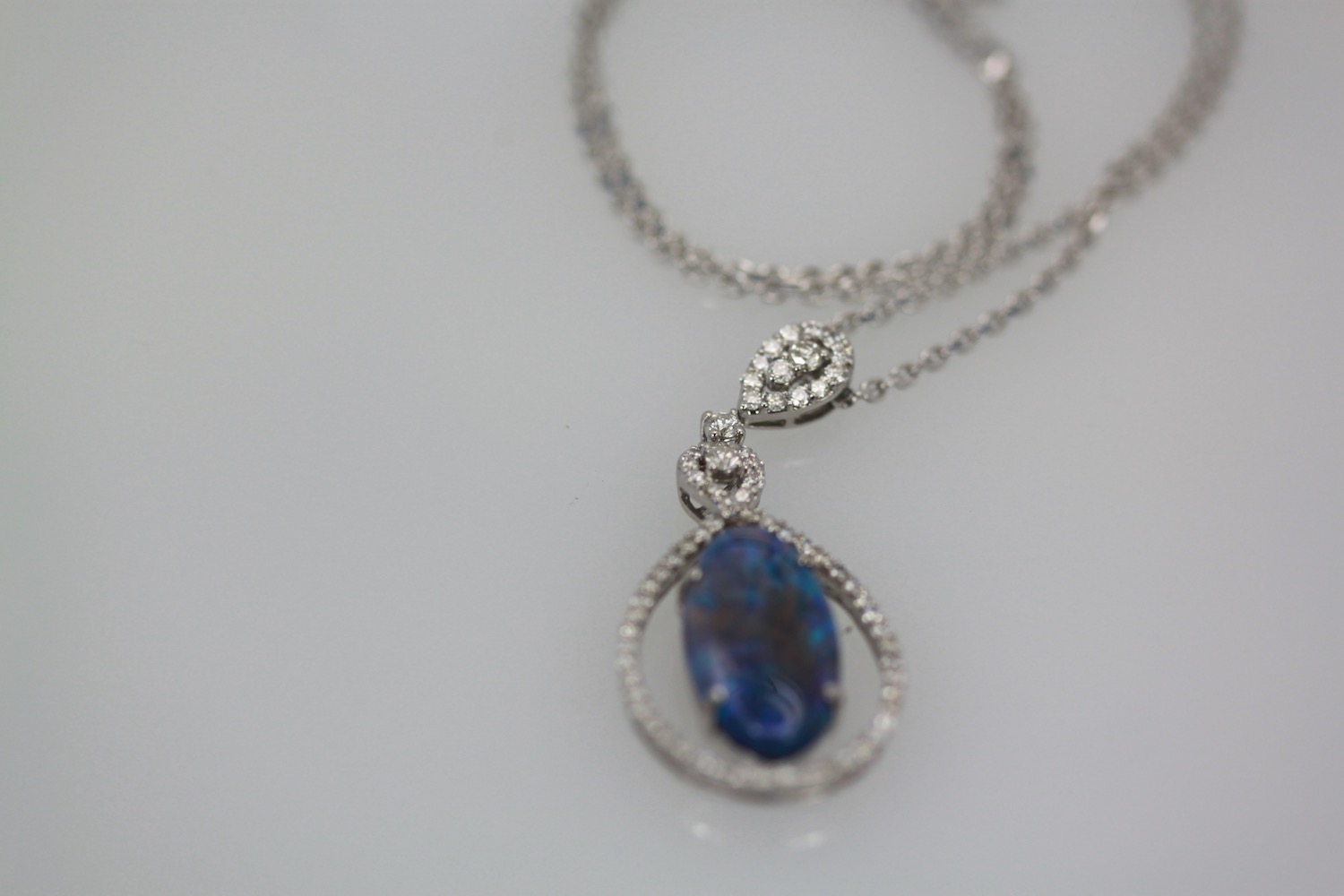 Black Crystal Opal Pendant with Diamond Surround – diamonds