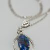 Black Crystal Opal Pendant with Diamond Surround - close up