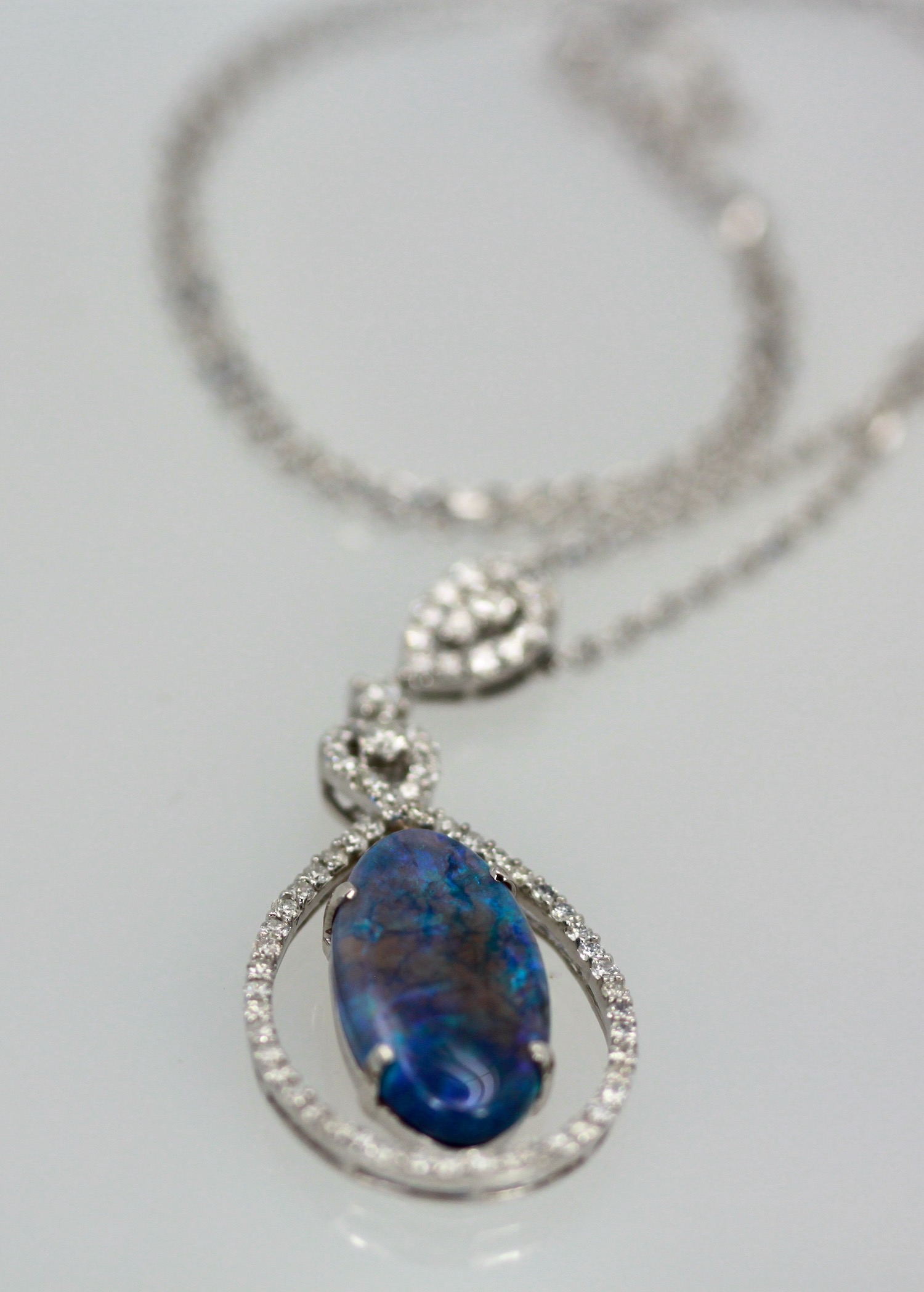 Black Crystal Opal Pendant with Diamond Surround – close up