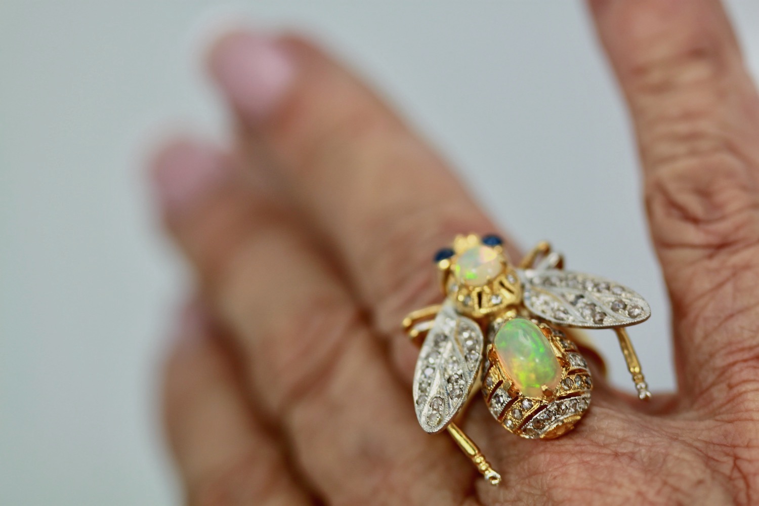 Opal Diamond Sapphire Articulated Bee Ring – on finger