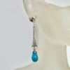 Deco Diamond Turquoise Drop Earrings - single on model